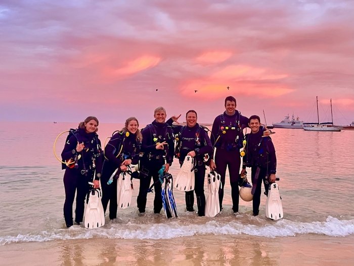 Students ready to enter the water for a night dive specialty
