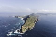 The famous Cape Point (South Africa) aerial view shot from a helicopter (with cape of good hope in the background)